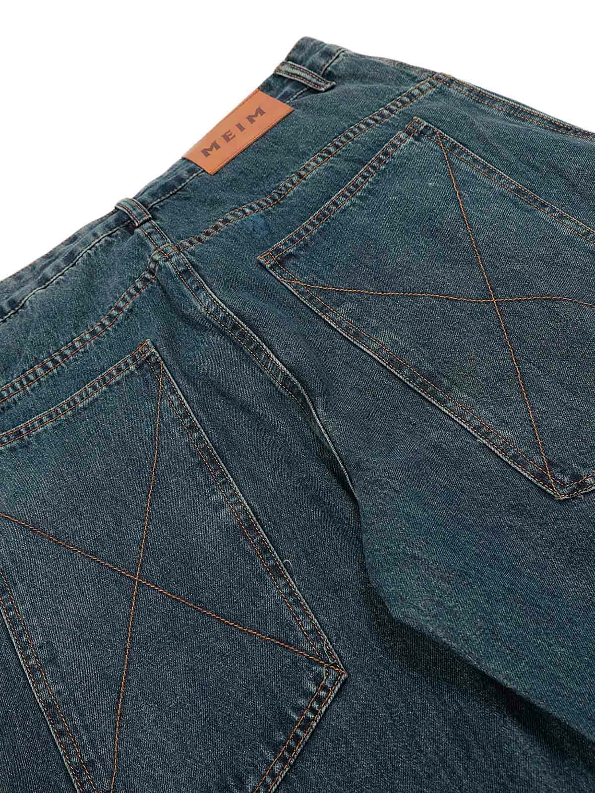 Gewaschene, dekonstruierte Baggy-Barrel-Jeans mit geteiltem Scimitar-Schnitt