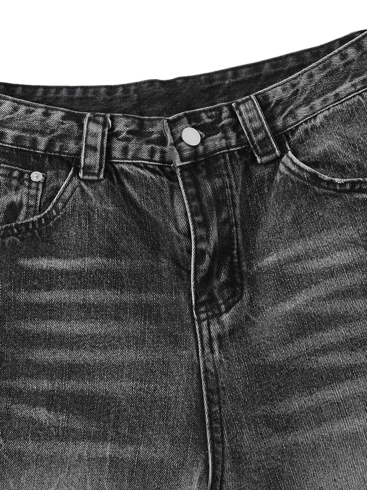 Kurze Jeanshose aus gewaschenem Patchwork-Denim im Used-Look
