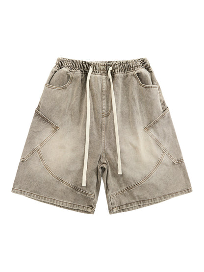 DEKONSTRUKTIERTE DENIM-SHORTS MIT KORDELZUG IM VINTAGE-WASCHVERKLEIDUNG