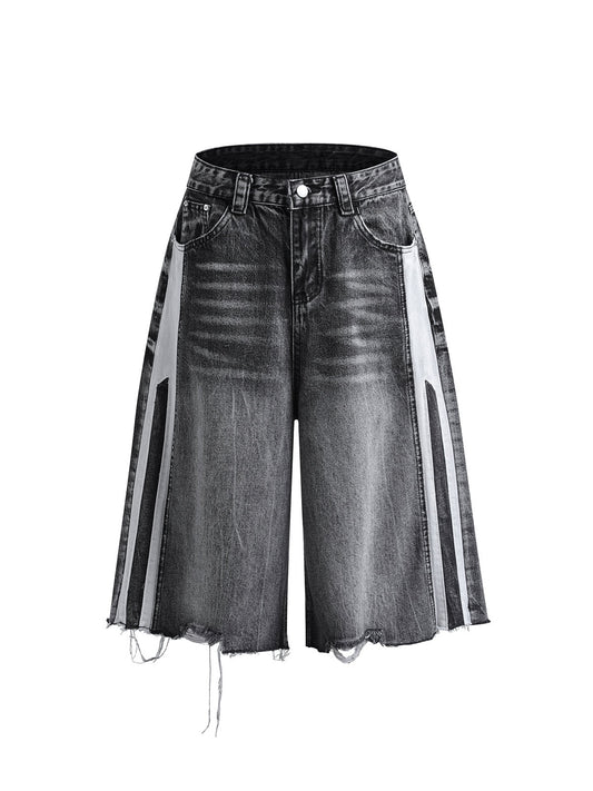 Kurze Jeanshose aus gewaschenem Patchwork-Denim im Used-Look
