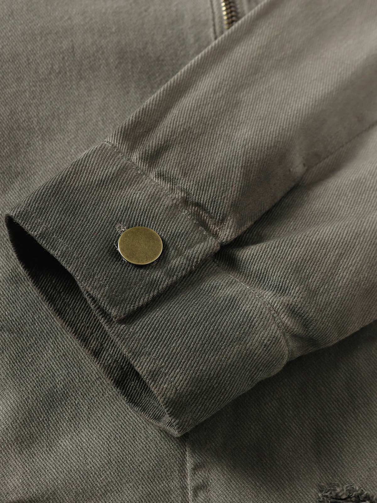 Distressed-Jeansjacke mit unregelmäßigem Reißverschluss