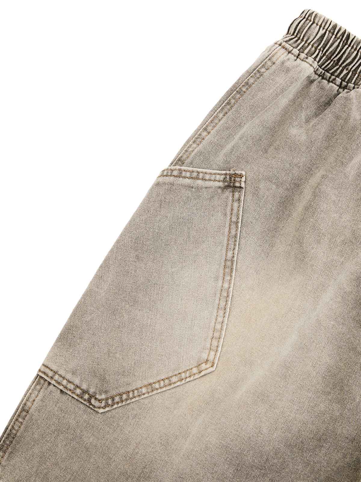 DEKONSTRUKTIERTE DENIM-SHORTS MIT KORDELZUG IM VINTAGE-WASCHVERKLEIDUNG
