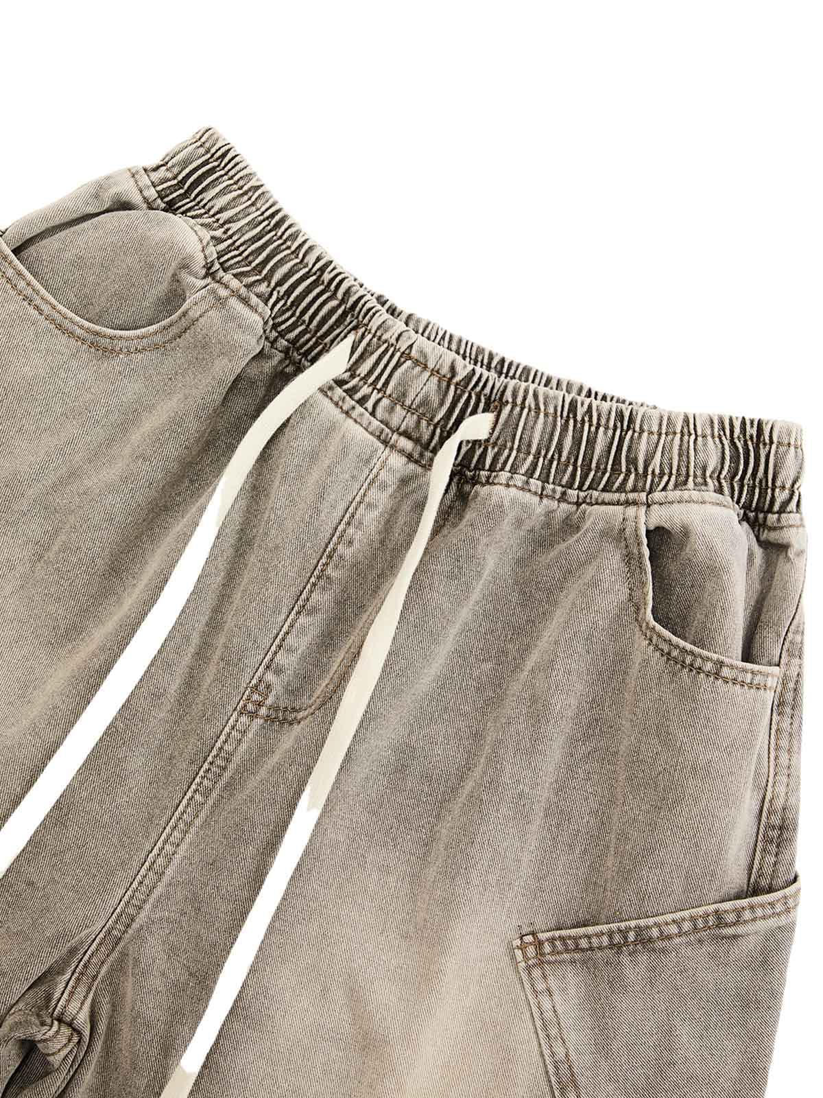 DEKONSTRUKTIERTE DENIM-SHORTS MIT KORDELZUG IM VINTAGE-WASCHVERKLEIDUNG