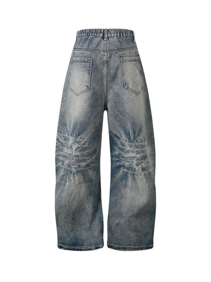 Verwaschene Distressed-Jeans im dekonstruierten Split Barrel-Stil