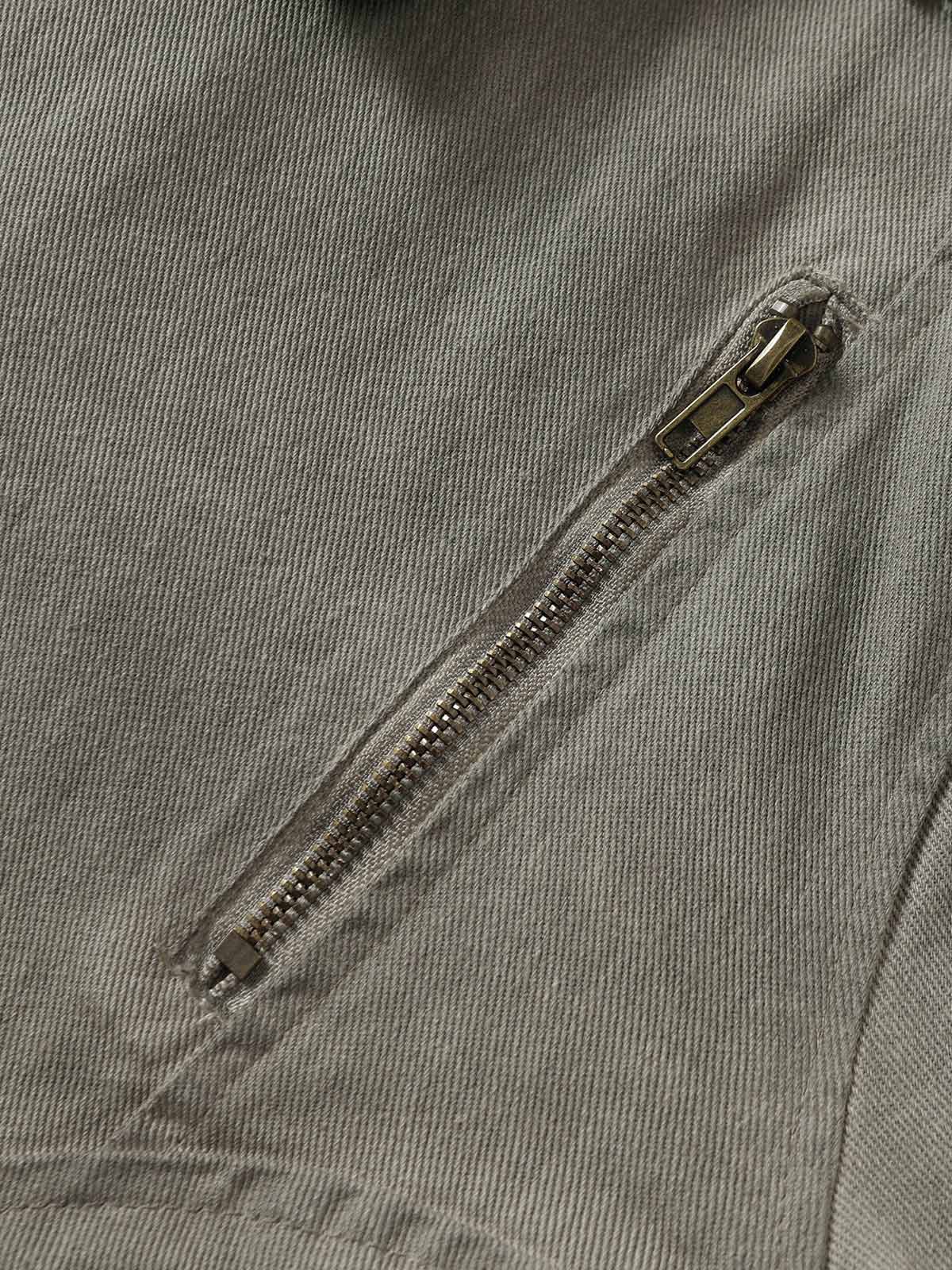 Distressed-Jeansjacke mit unregelmäßigem Reißverschluss