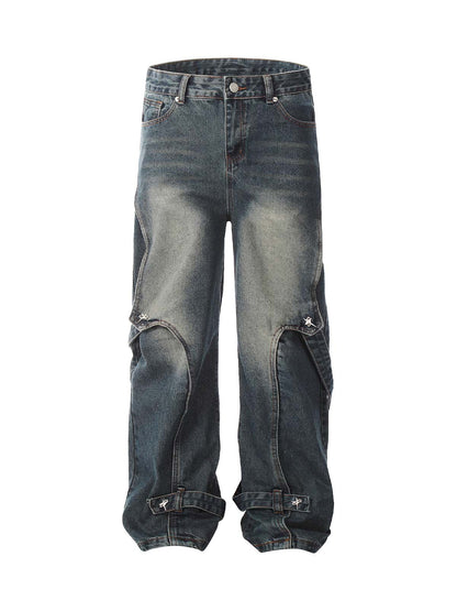 Verwaschene, dekonstruierte Split-Work-Jeans im Used-Look