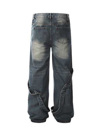Verwaschene, dekonstruierte Split-Work-Jeans im Used-Look