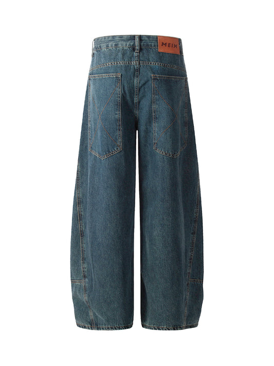 Gewaschene, dekonstruierte Baggy-Barrel-Jeans mit geteiltem Scimitar-Schnitt