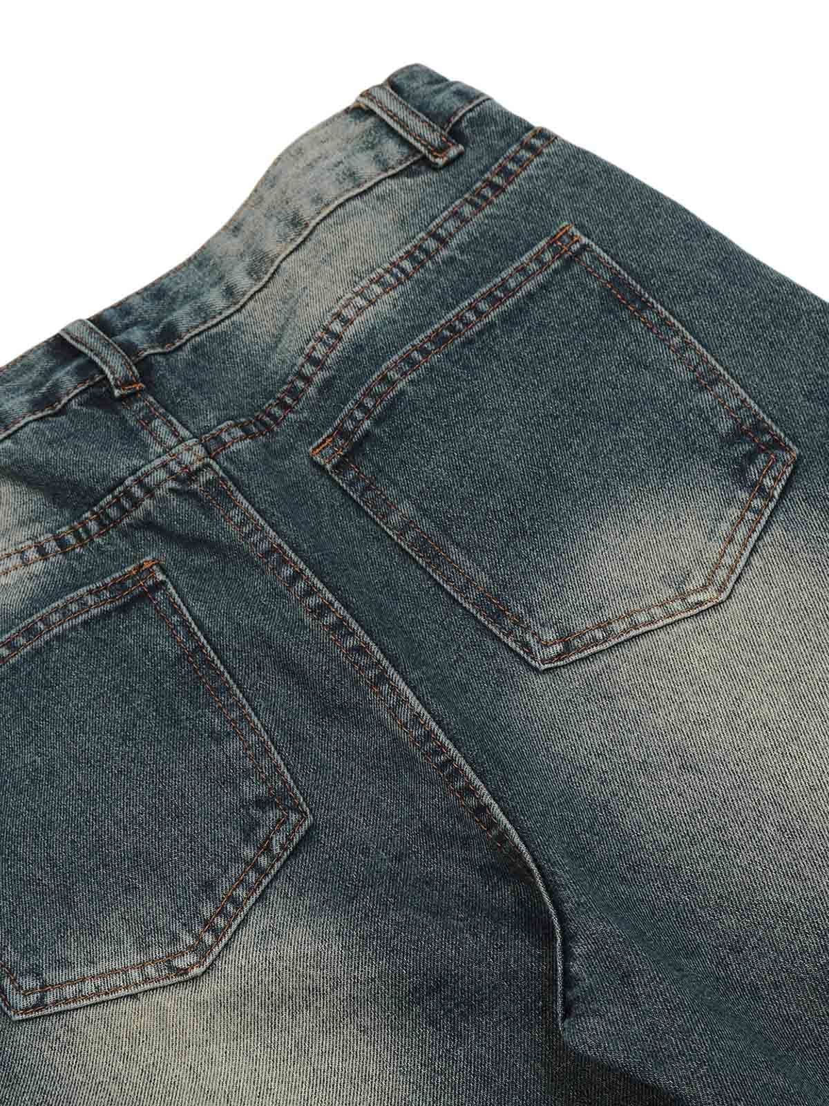 Verwaschene, dekonstruierte Split-Work-Jeans im Used-Look